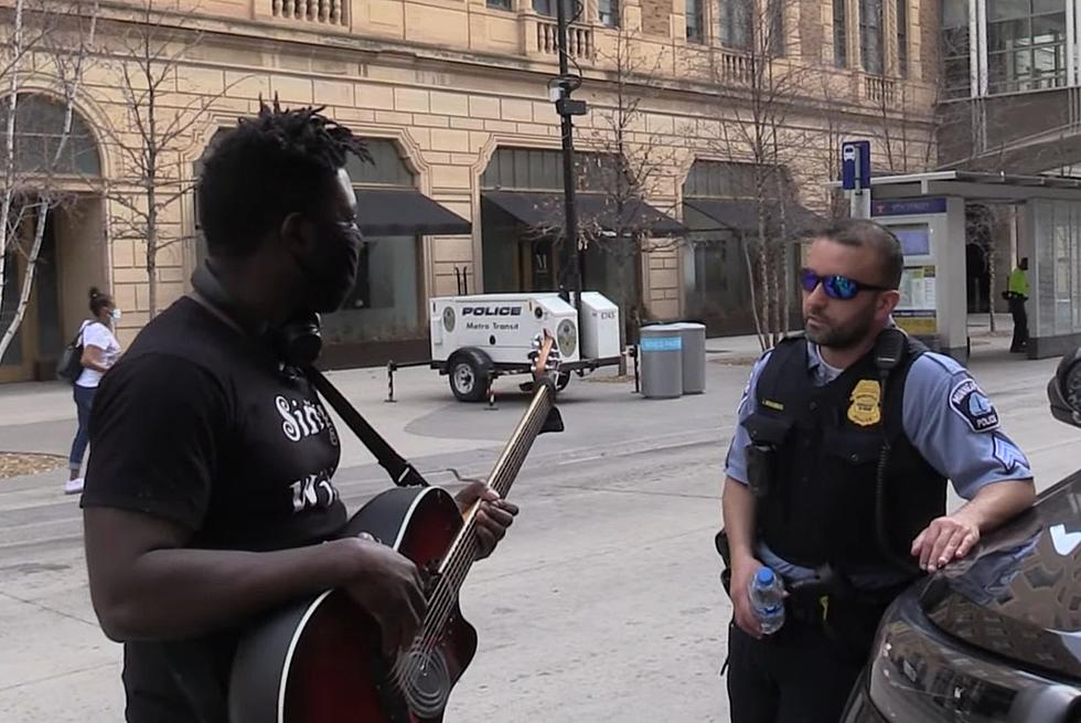 Street Performer Gets Mpls Cop To Sing Prince Song With Him