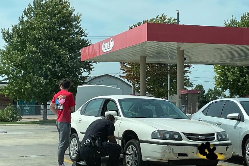 Sioux Falls Cop Takes Time To Change Citizens Flat Tire