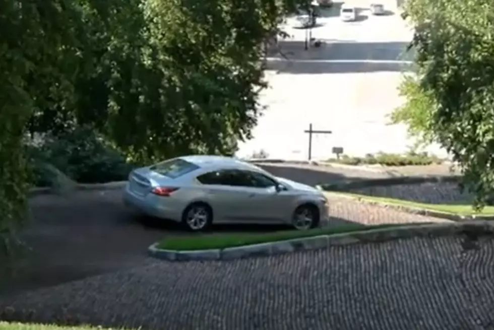 Car driving down Snake Alley in Burlington Iowa