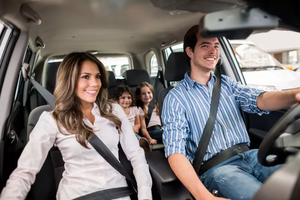 family in car