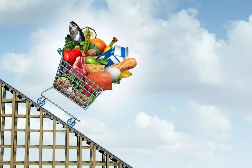 Grocery cart going up rollercoaster