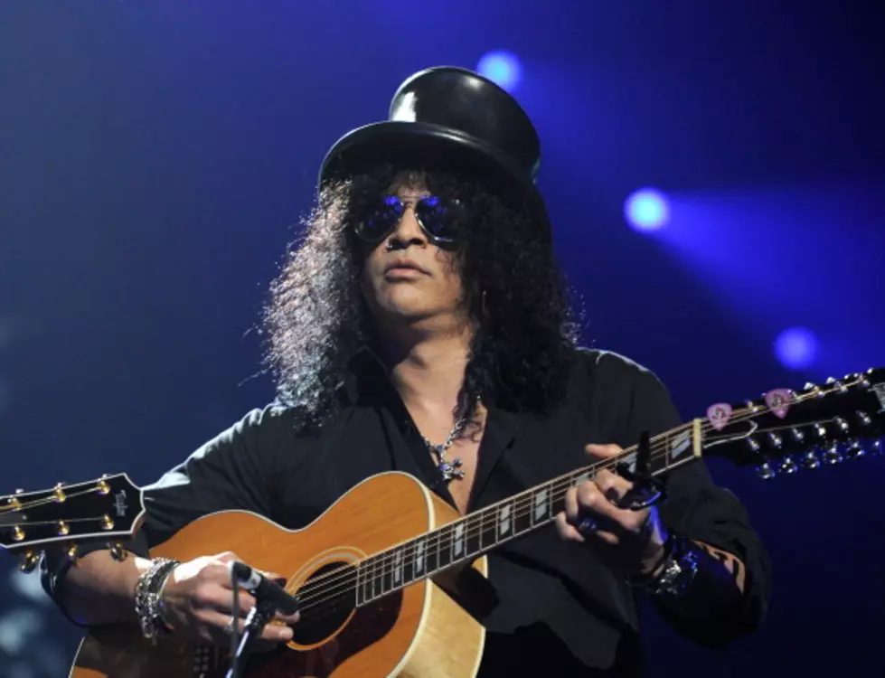 Slash Caught His Mom With…?