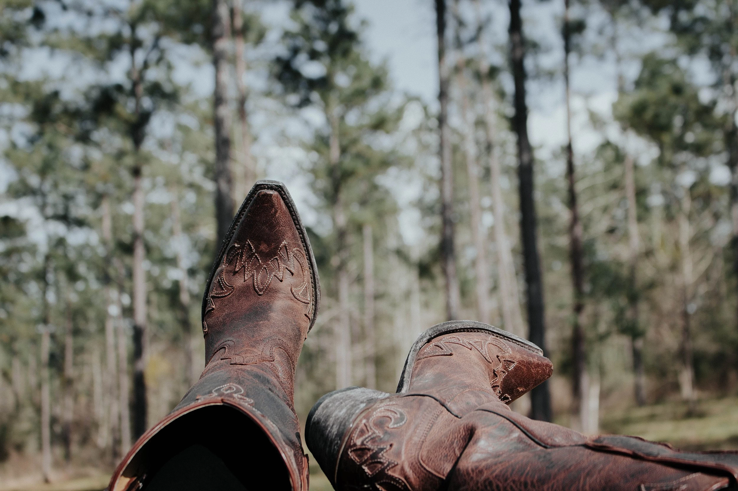 What Does It Mean When You See Cowboy Boots on a Fencepost?
