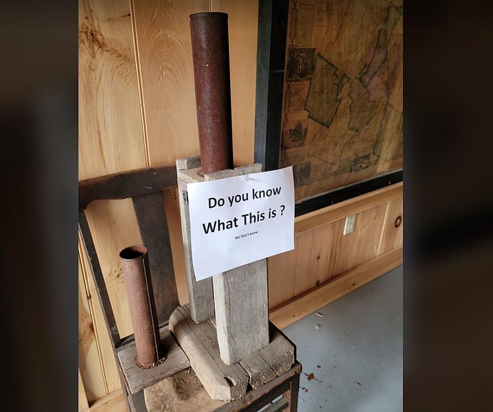 Can You Help These Maine Fair Officials Identify This Strange Iron and Wooden Object?