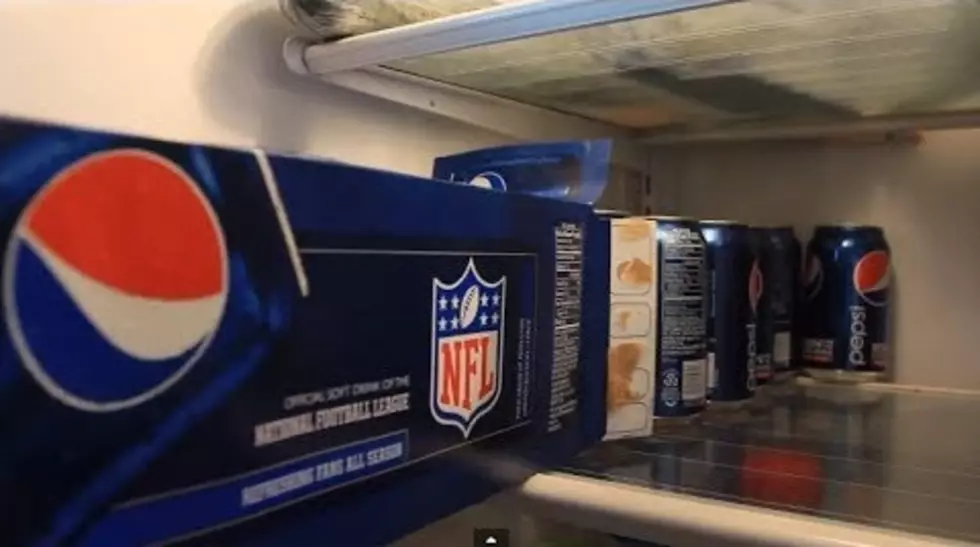 By Far the Quickest, Easiest Way to Empty a Case of Sodas into Your Fridge [VIDEO]
