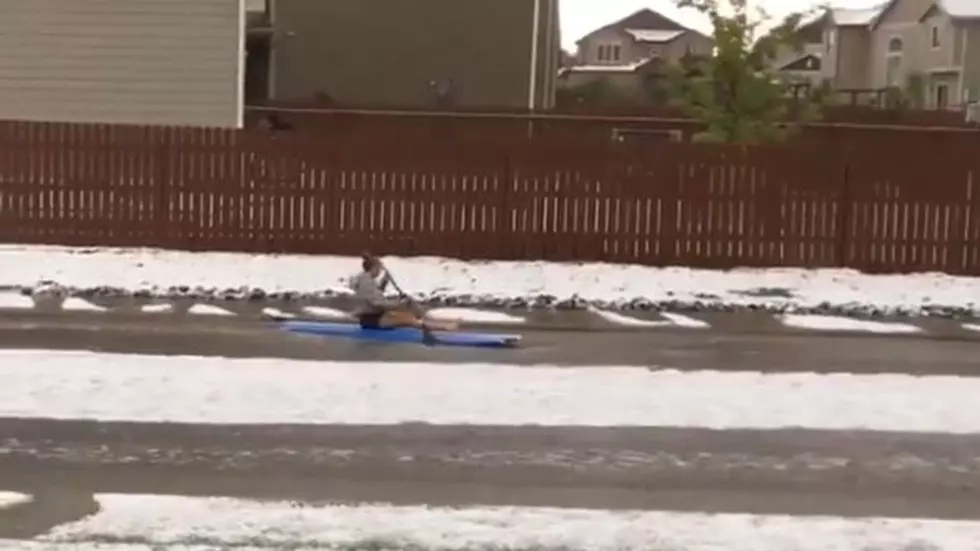Colorado Woman Kayaks Down Street After Storm [Watch]