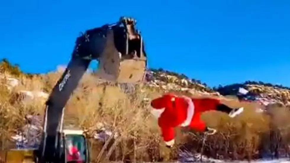 Watch a Colorado Santa 'Fly' With the Help of an Excavator