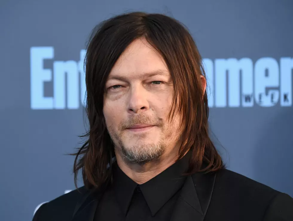 Norman Reedus from the Walking Dead Wheeled off a News Set?