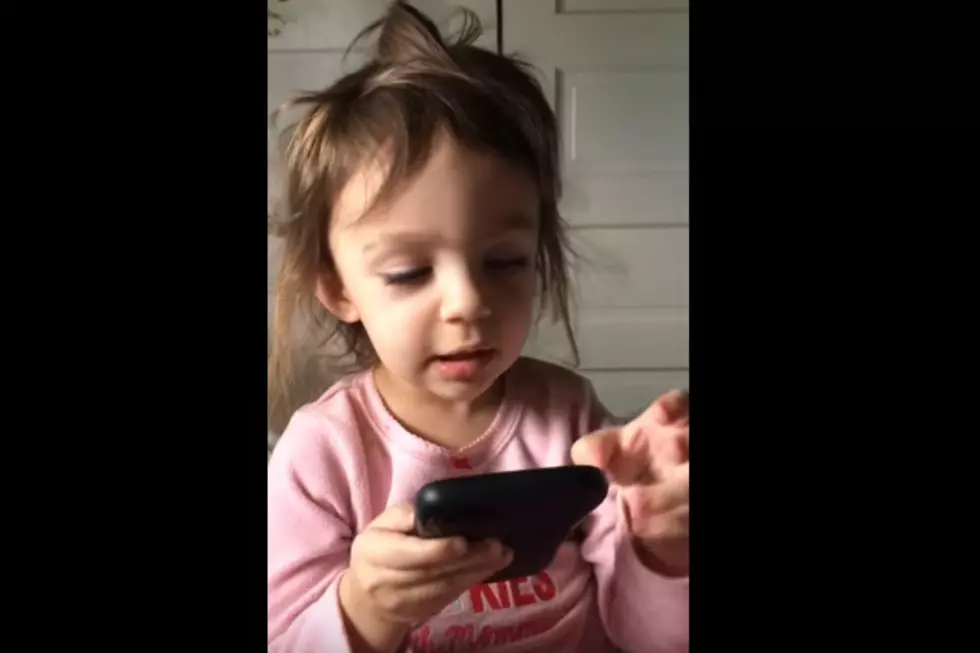Your Friday Smile: Toddler Tries to Have a Conversation with Siri