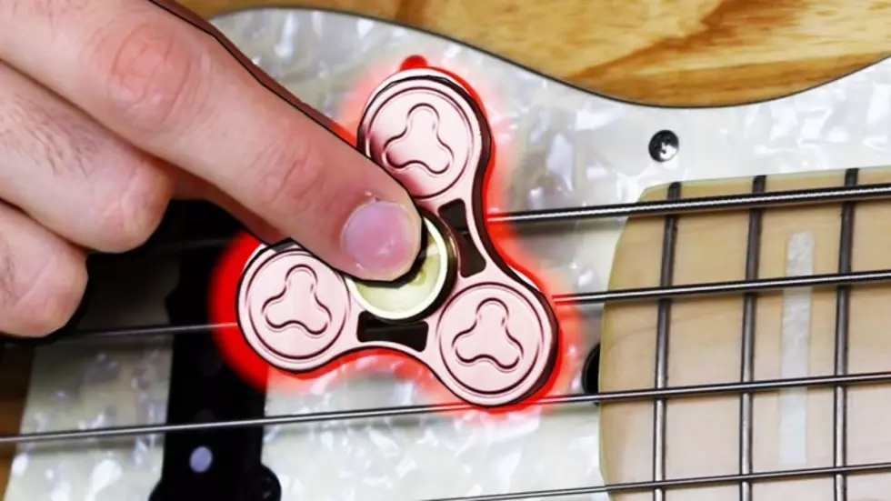 Playing a Bass Guitar With a Fidget Spinner