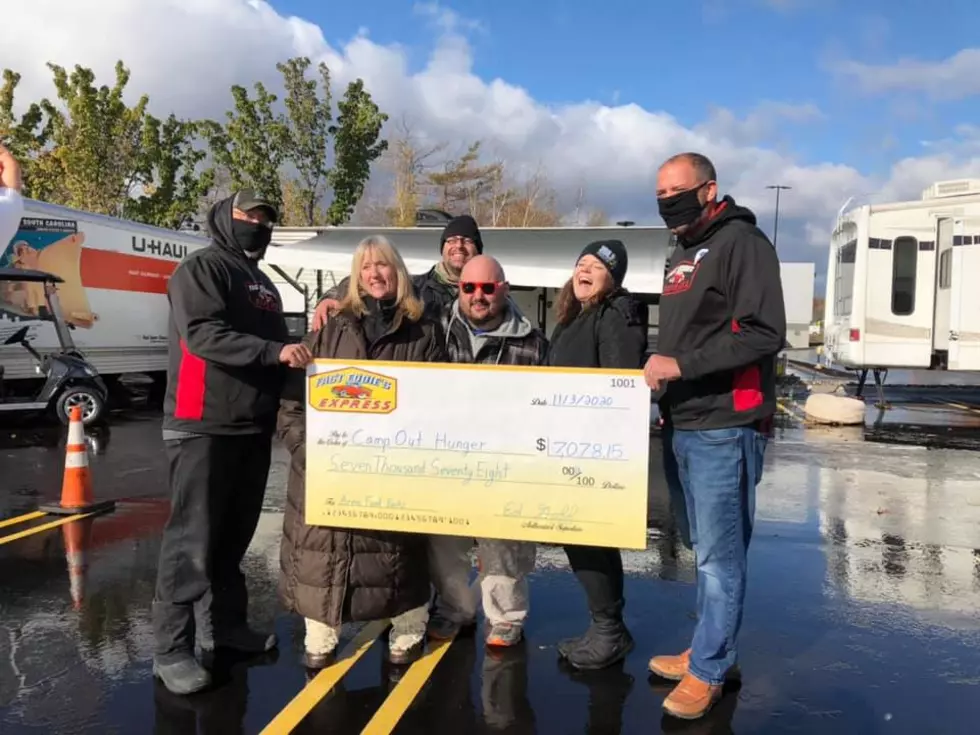 Fast Eddie&#8217;s Present Check of More Than 7K to Camp Out Hunger