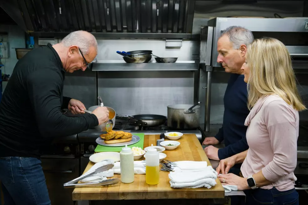 Chef Robert Irvine discussing new menu items with owners, Jennifer and John Opalenski, as seen on Restaurnt Impossible, Season 20