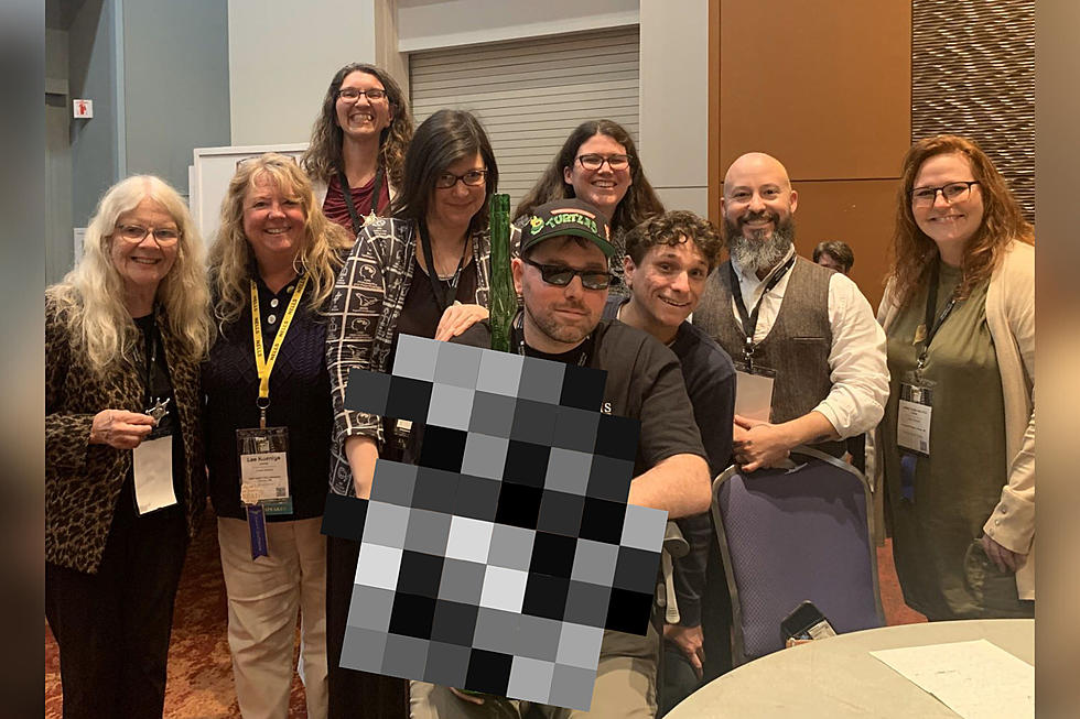 Are These Maine Librarians Really Taking a Picture With a Giant Bong?