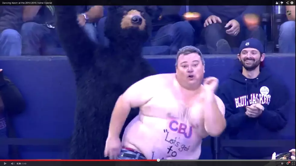 Bare-Chested Fan Dances With Bear [VIDEO]