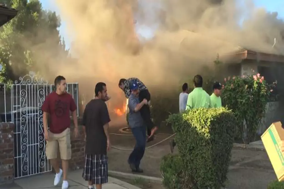 Watch as Hero Saves Man from Burning Home [VIDEO]