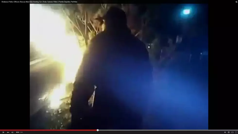 Dramatic Video Shows Police Pulling Man From Burning Car [VIDEO]