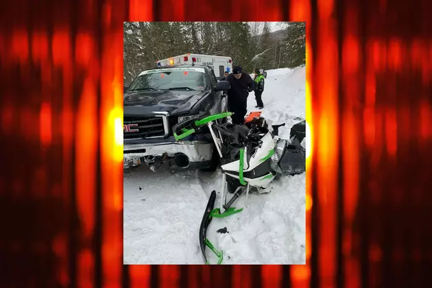 Snowmobile Driver Hurt When Sled Hit Pickup In Roadway