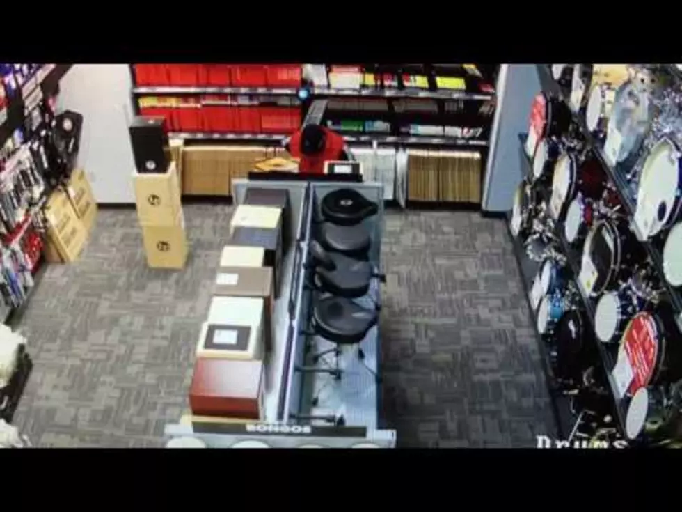 Security Camera Catches Guy Shoving Guitar Down His Pants [VIDEO]