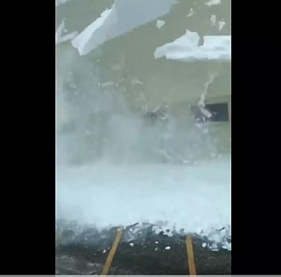 Maine Plow Driver Loses His Mind When Epic Amount of Snow Comes Crashing Off Building [NSFW]