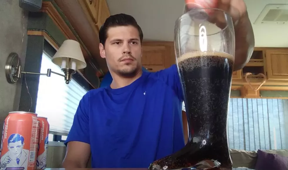 Watch This Guy Attempt To Chug A 2-Liter Bottle Of Moxie