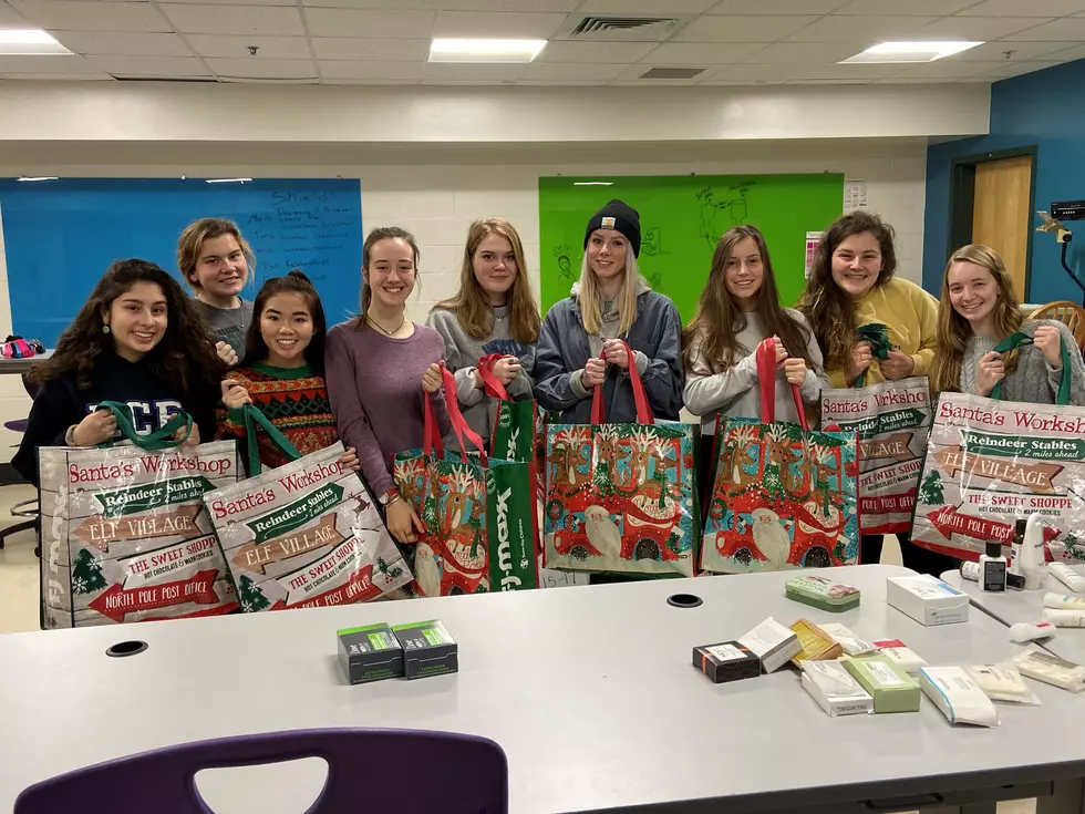 MDIHS Interact Club Puts Together 32 Christmas Bags