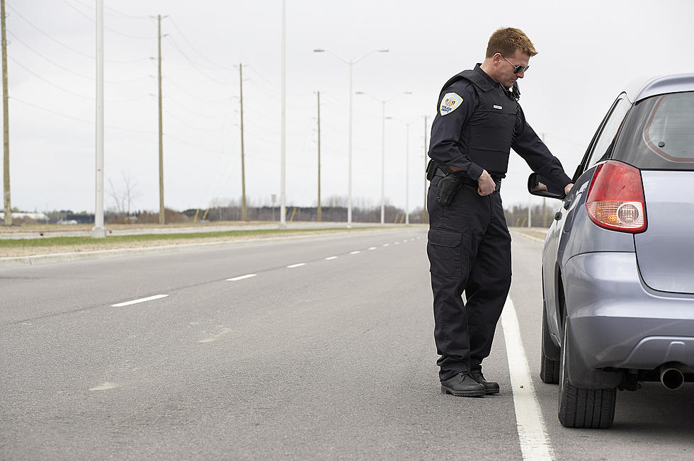 Why Do Police Officers Touch Your Car During A Traffic Stop