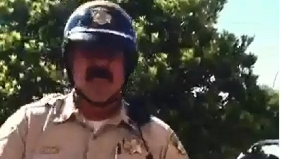 12 Year Old Boy Calls Out Cop for Breaking the Law [VIDEO]