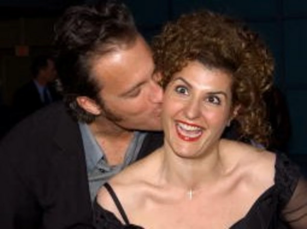 Today is 'Sneak A Kiss' Day