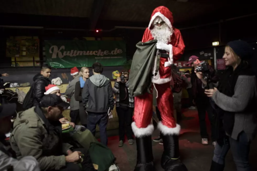 Man Dressed as Santa Shows Love to Homeless