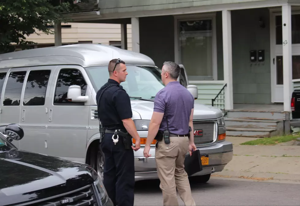 One Suspect Charged, Another Sought in Binghamton Shooting