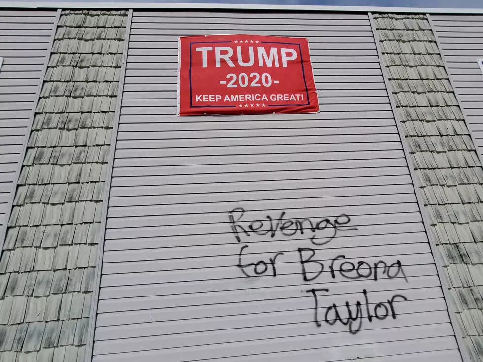 Graffiti Sprayed Below Trump Campaign Sign at Binghamton Store