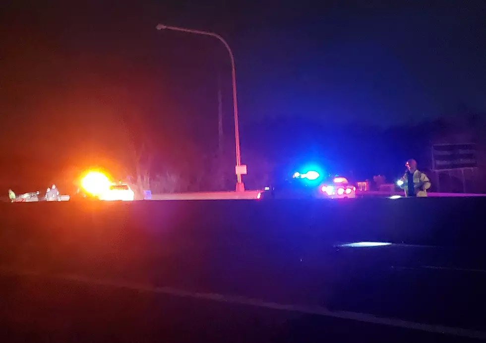 A state Department of Transportation worker examines crash debris on Route 26 on May 6, 2021. Photo: Bob Joseph/WNBF News)