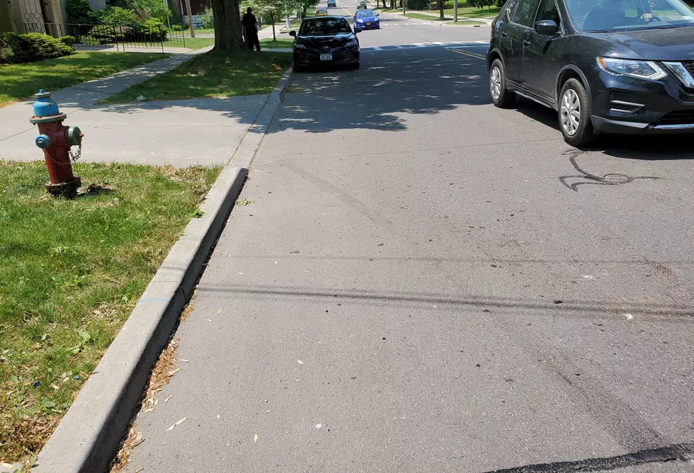 Skid marks show the path of a pickup truck that crossed Riverside Drive and struck Beth David Synagogue on May 26, 2021. Photo: Bob Joseph/WNBF News