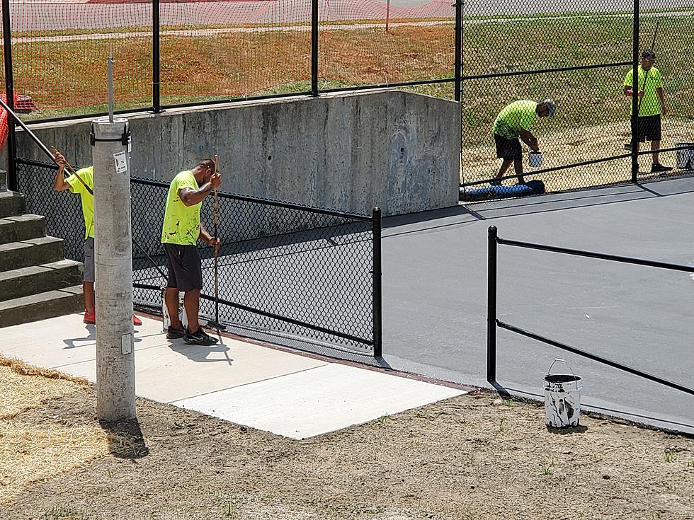 Astroturf Crews Cope with Oppressive Heat on Rec Park Tennis Job