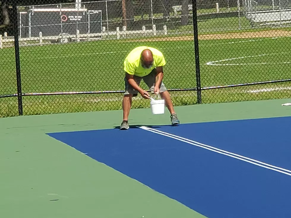 A worker at the new Recreation Park tennis facility on September 7, 2021. (Photo: Bob Joseph/WNBF News)