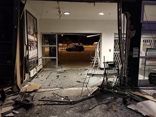 A stolen vehicle smashed through the doors of a Dick's Sporting Goods store in Greece on March 25, 2023. (Photo: Greece Police Department)