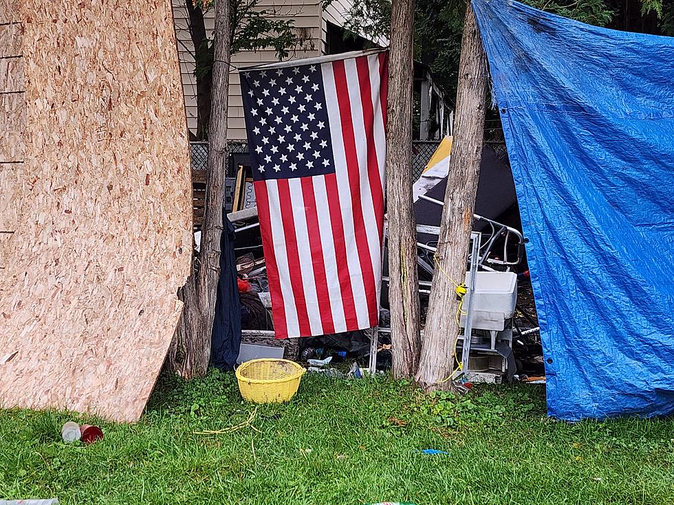 Endicott Crews Remove Piles of Trash Outside Condemned House