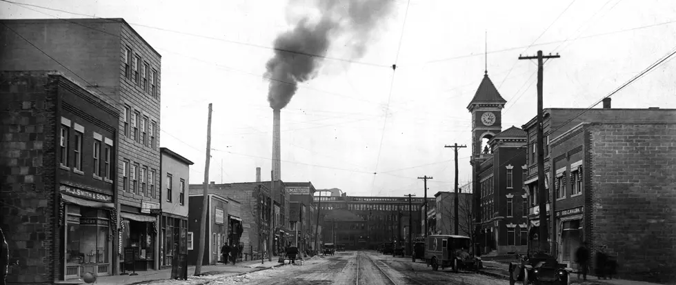 A 1916 view of Washington Avenue with the village hall on the right and an Endicott Johnson factory smokestack in the background. (Photo: Broome County Historical Society)