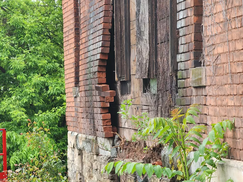 A damaged brick wall on the south side of 263 Washington Street on May 21, 2025. (Photo: Bob Joseph/WNBF News)