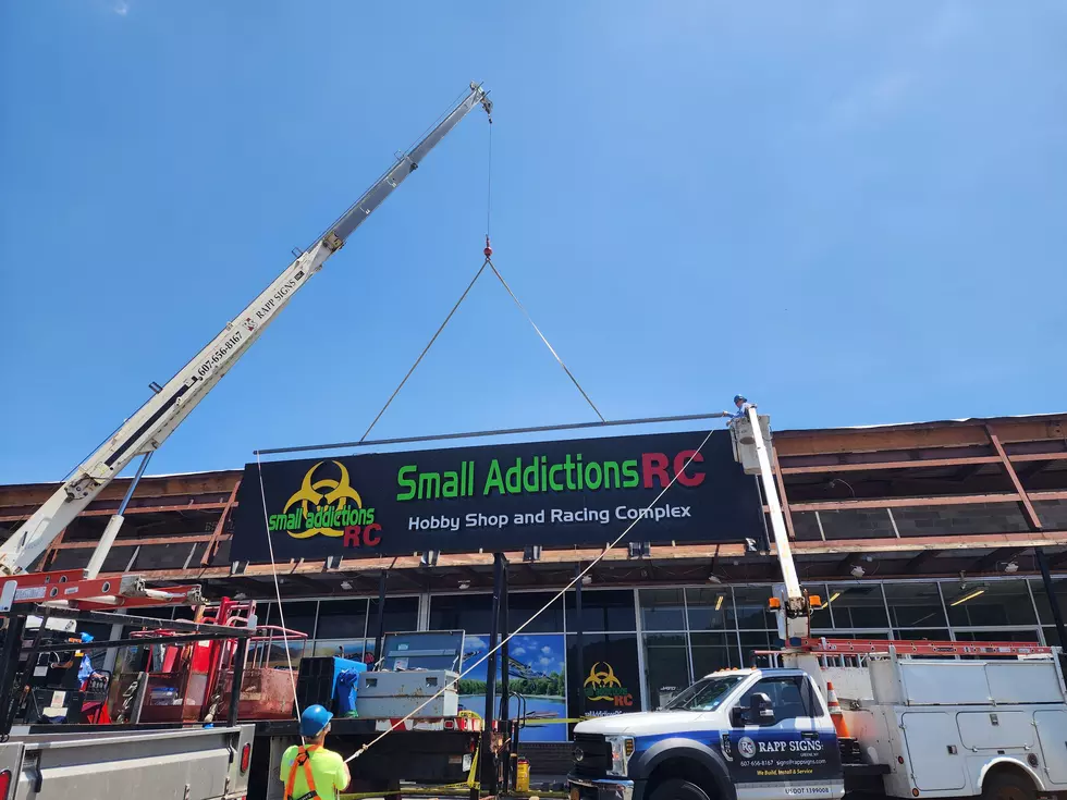 Workers were removing a large sign from the Small Addictions RC store at the Northgate Plaza on June 23, 2025. (Photo: Bob Joseph/WNBF News)