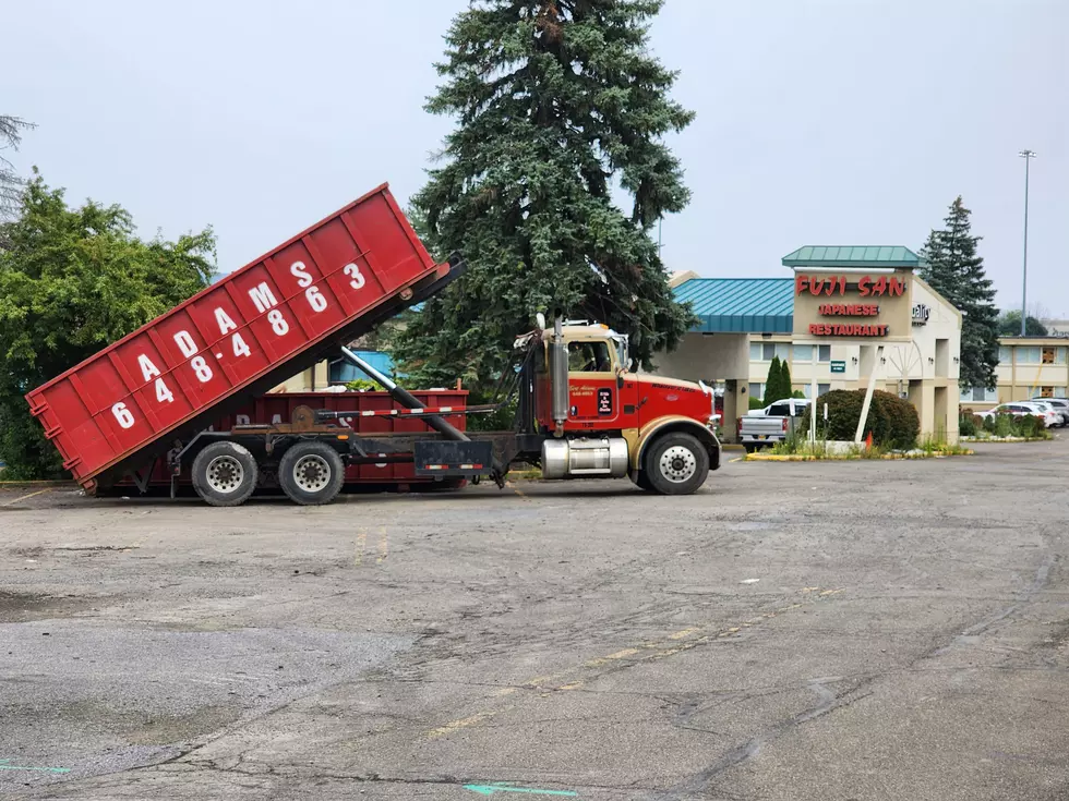 A Bert Adams Disposal truck delivered a roll-off dumpster to the site of a planned Vestal Parkway housing complex on August 6, 2025. (Photo: Bob Joseph/WNBF News)