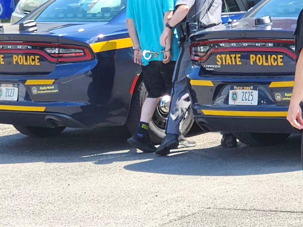 A man was led to a state police troop car on August 14, 2025. (Photo: Bob Joseph/WNBF News)