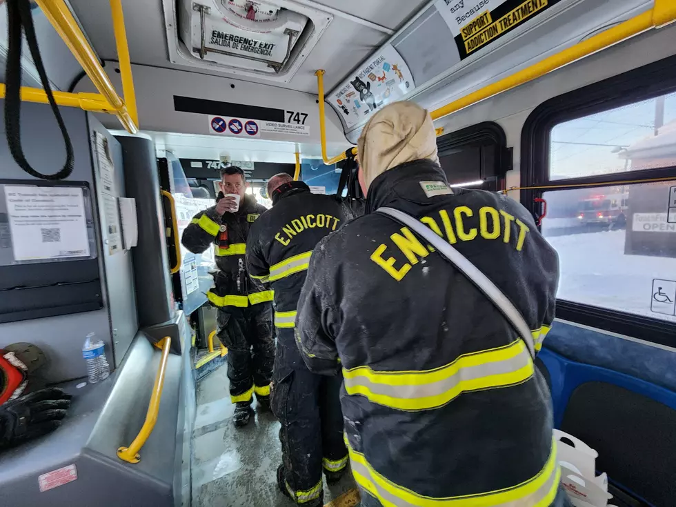 Firefighters took a break to warm up inside a BC Transit bus on January 28, 2026. (Photo: Bob Joseph/WNBF News)