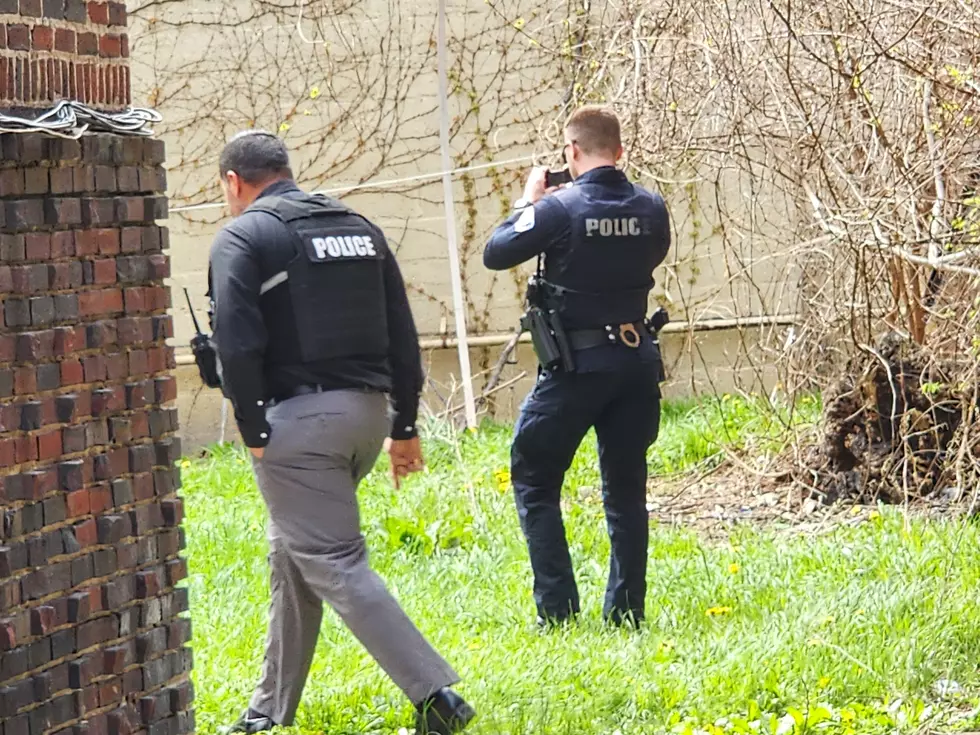 Binghamton police searched an area near an apartment building at Main and Oak streets on April 23, 2026. (Photo: Bob Joseph/WNBF News)