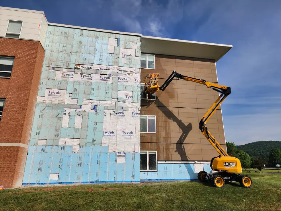 Some of the original material had been removed from exterior of the SUNY Broome Student Village building on June 1, 2026. (Photo: Bob Joseph/WNBF News)
