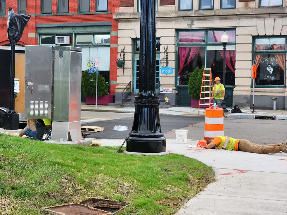 Binghamton Road Electric employees are installing new traffic and pedestrian signals at Henry and Water streets. (Photo: Bob Joseph/WNBF News)