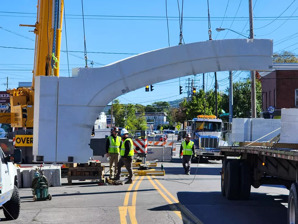 A precast concrete section for the restored Square Deal Arch was hoisted over Main Street in Johnson City on October 6, 2026. (Photo: Bob Joseph/WNBF News)
