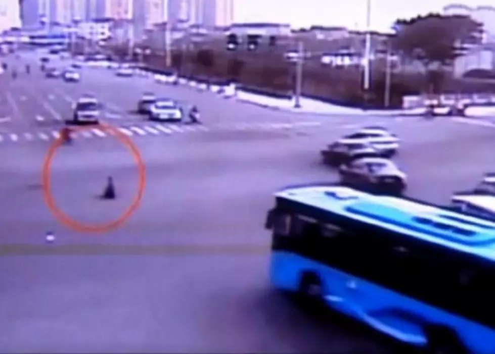 3-Year-Old Boy Rides His Motorbike Into Busy Itersection In China [VIDEO]