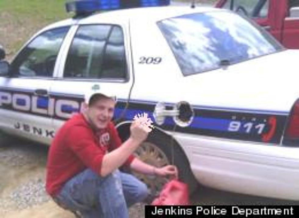 Man Arrested After Posting A Facebook Photo Of Him Stealing Gas From Police Car