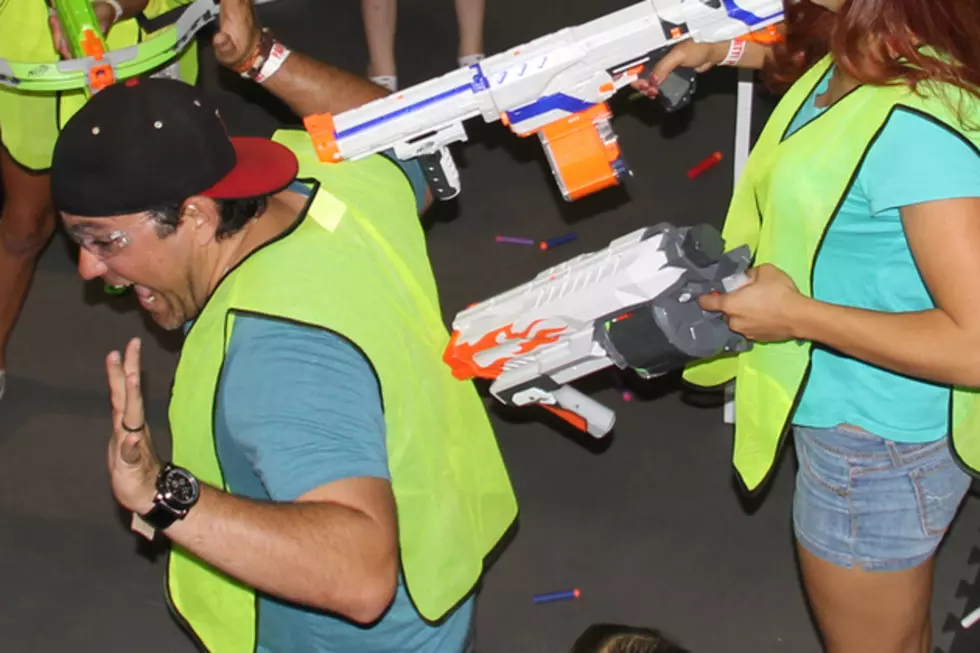 Nothing Says “Team Building,” Like Shooting One Another With Soft Dart Guns [VIDEO]